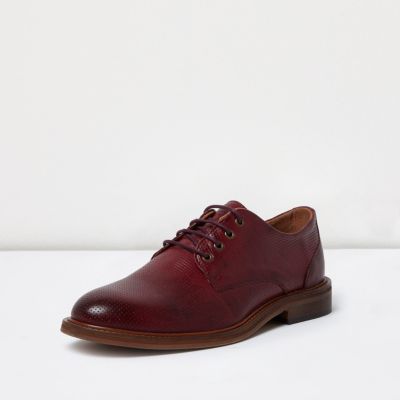 Red leather lace up shoes